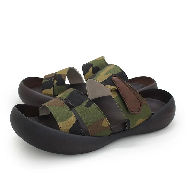 The iconic “Big Foot” sandal design reinterpreted in a lightweight version for comfort and style.
