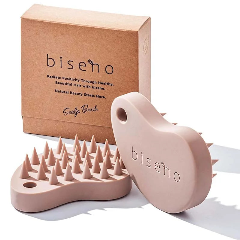 The Biseno Silicone Shampoo Brush is a beautifully designed scalp massage and cleansing tool that enhances your daily hair care routine. 