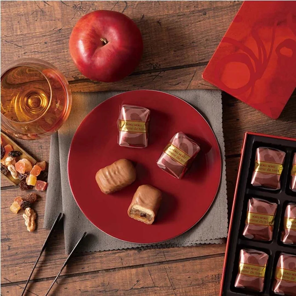 Fruit Cake Wrapped in Marzipan & Milk Chocolate | Adult DessertPomme de Terre, meaning “potato” in French, is a classic Yoku Moku confection cherished since its debut in 1972.