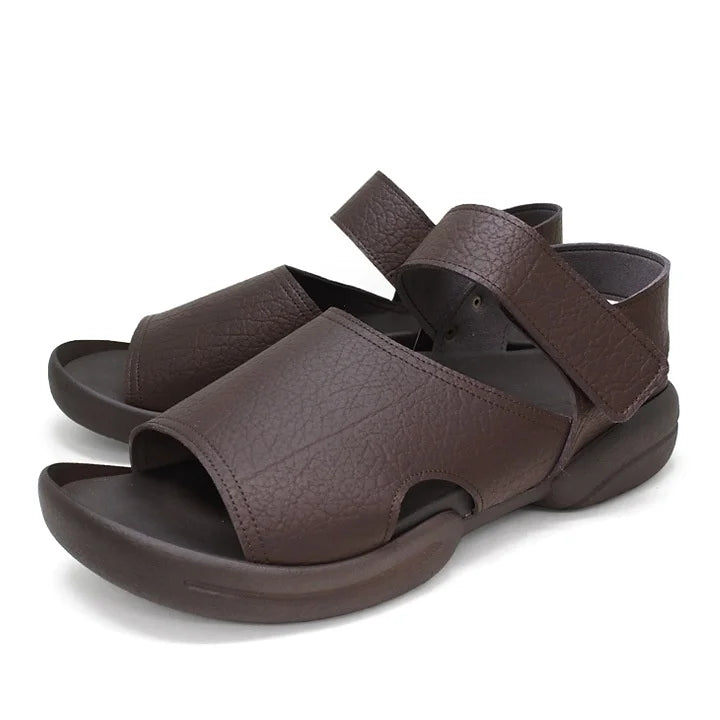 This comfort-focused sandal features a stylish two-belt design with Velcro closures for an easy, adjustable fit.